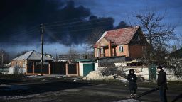 Black smoke rises from a military airport in Chuguyev near Kharkiv  on February 24, 2022. - Russian President Vladimir Putin announced a military operation in Ukraine on Thursday with explosions heard soon after across the country and its foreign minister warning a "full-scale invasion" was underway. (Photo by Aris Messinis / AFP) (Photo by ARIS MESSINIS/AFP via Getty Images)