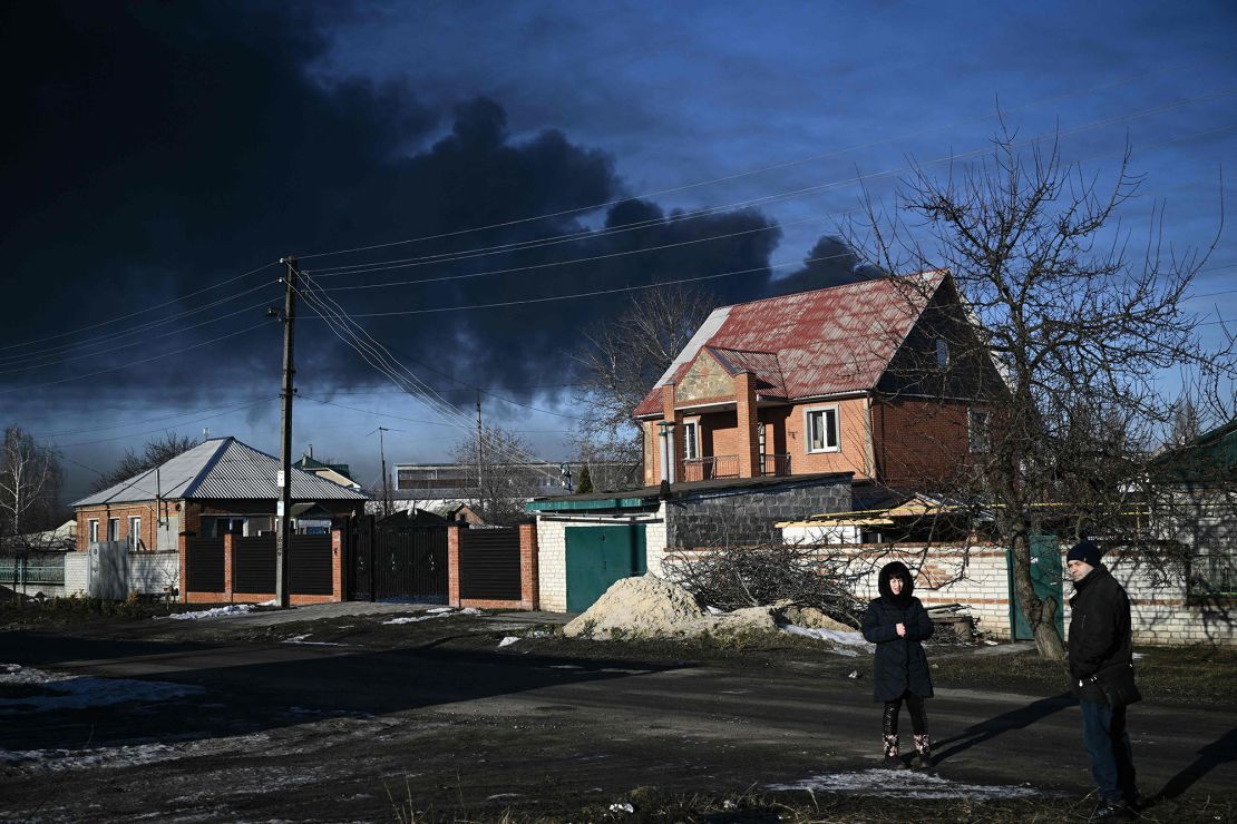 Black smoke rises from a military airport in Chuguyev near Kharkiv, the second-largest city in Ukraine,  on Thursday.