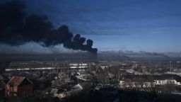 TOPSHOT - Black smoke rises from a military airport in Chuguyev near Kharkiv  on February 24, 2022. - Russian President Vladimir Putin announced a military operation in Ukraine today with explosions heard soon after across the country and its foreign minister warning a "full-scale invasion" was underway. (Photo by Aris Messinis / AFP) (Photo by ARIS MESSINIS/AFP via Getty Images)