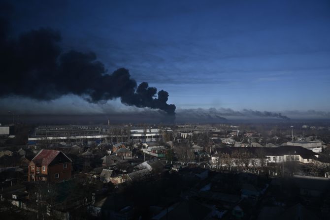 Smoke rises from a military airport in Chuhuiv on February 24. <a href="index.php?page=&url=https%3A%2F%2Fwww.cnn.com%2F2022%2F02%2F24%2Feurope%2Fukraine-russia-attack-timeline-intl%2Findex.html" target="_blank">Airports were also hit</a> in Boryspil, Kharkiv, Ozerne, Kulbakino, Kramatorsk and Chornobaivka.