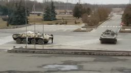 Russian military vehicles are at the Chernobyl nuclear accident site near Pripyat, Ukraine, according to videos uploaded to social media.  
 
Earlier on Thursday, State Agency of Ukraine on Exclusion Zone Management Spokesperson Yevgeniya Kuznetsovа told CNN that the Russian military had taken control over the plant.  
 
"As you can see, we are surrounding by these tanks," an individual is heard saying on one of the videos posted to social media.  
 
In the three videos, three vehicles are seen; one of the vehicles is a Russian tank and is emblazoned with a white "v" on the front.  
 
Similar white markings have suddenly appeared on Russian military vehicles in recent days.
 
The vehicles are parked outside of one of the main buildings in the same complex as Chernobyl's damaged nuclear reactor.  They are roughly 3,000 feet from the New Safe Confinement shield.  
 
"We were attacked," a man is heard saying in the video.  "There is another man with us. They all just disappeared. The station is completely empty." 
 
The man moved around a room in the complex building as he filmed.
 
"Damn it," he said.  "They've even left their helmets, there is not a single ensign anywhere.
 
On Thursday, Ukrainian President Volodymyr Zelensky said on Twitter that Russian forces were attempting to seize control of the Chernobyl Nuclear Power Plant.
 
"Russian occupation forces are trying to seize the Chernobyl [Nuclear Power Plant]. Our defenders are sacrificing their lives so that the tragedy of 1986 will not be repeated," Zelensky tweeted.
