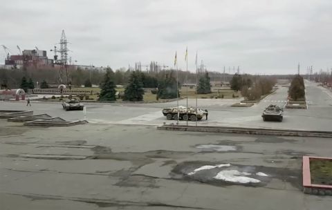 Russian military vehicles are seen at the Chernobyl power plant near Pripyat, Ukraine, on February 24. Russian forces seized control of the the plant, the site of the world's worst nuclear disaster.