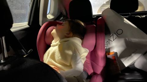 The Lysenkos' daughter is seen in the back seat.