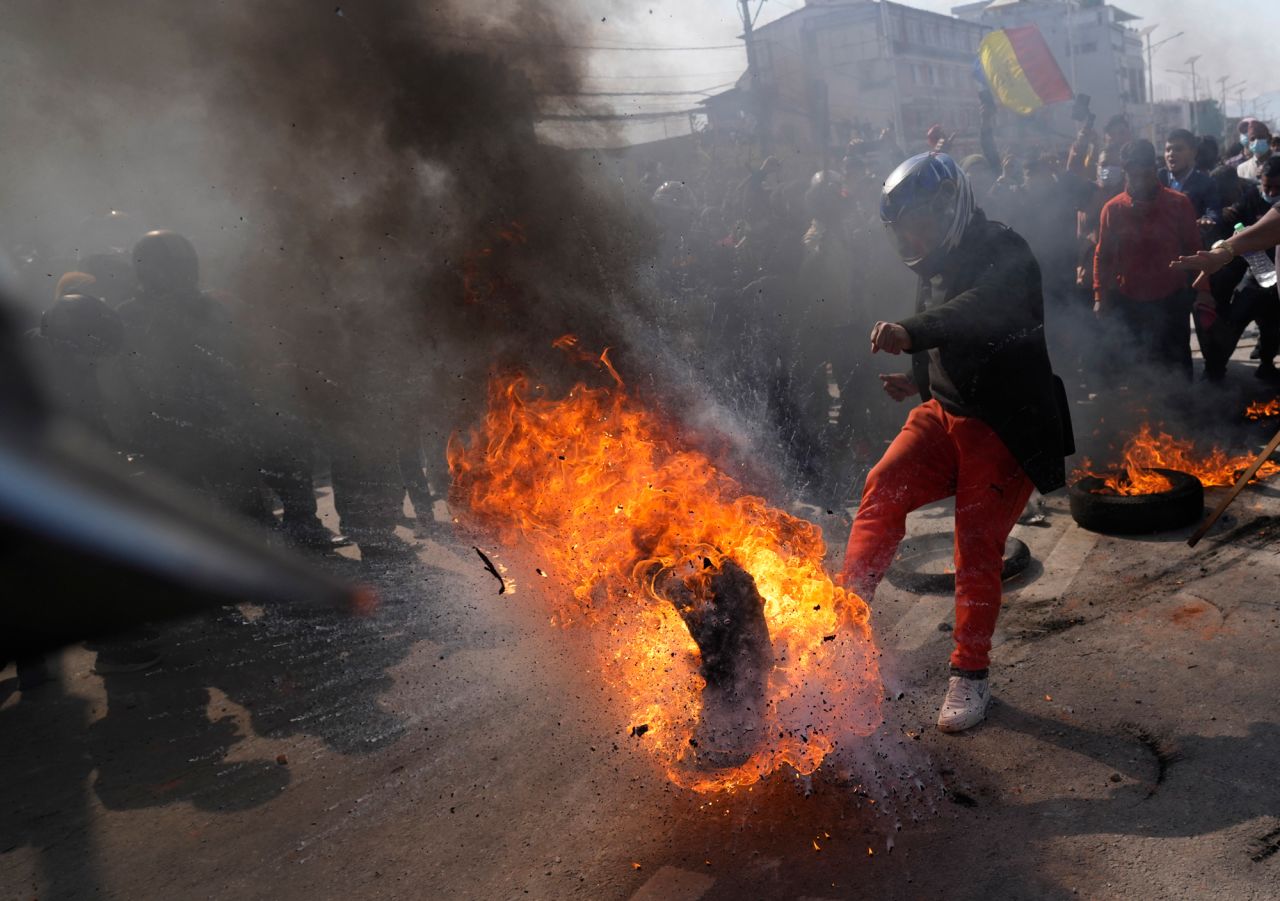 Protesters opposing a proposed <a href="https://www.cnn.com/2022/02/20/asia/nepal-protest-us-infrastructure-intl-hnk/index.html" target="_blank">US-funded infrastructure program</a> clash with police in Kathmandu, Nepal, on Sunday, February 20. A US government aid agency agreed in 2017 to provide $500 million in grants to fund a 300 kilometer (187 mile) electricity transmission line and a road improvement project in Nepal. Government officials said the grant will not have to be repaid and has no conditions attached, but opponents say the agreement would undermine Nepal's laws and sovereignty as lawmakers would have insufficient oversight of the board directing the infrastructure project.