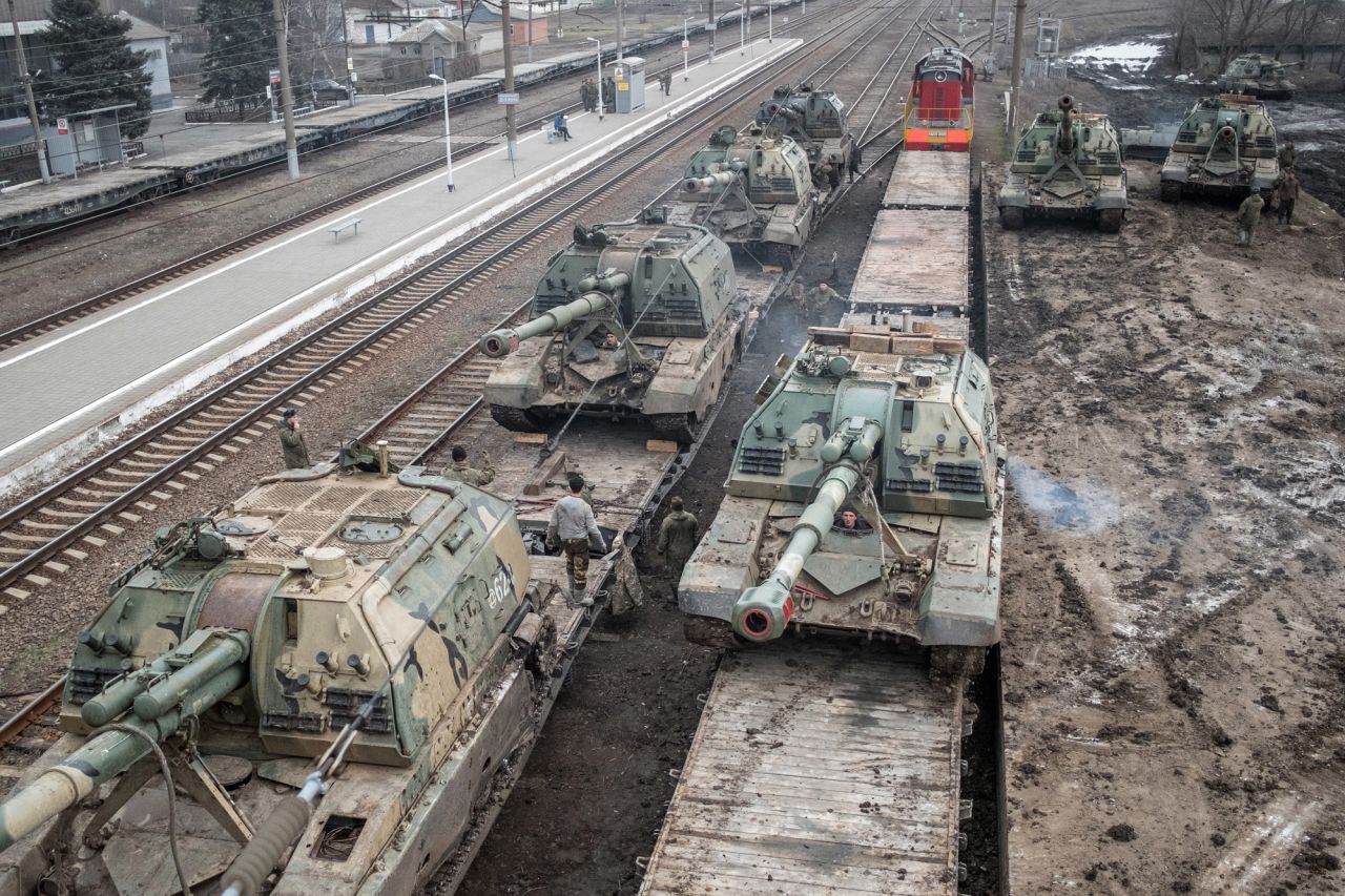 Russian howitzers are loaded onto train cars near Taganrog, Russia, on Tuesday, February 22. Russia has been <a href="https://www.cnn.com/2022/02/14/world/gallery/ukraine-russia-crisis/index.html" target="_blank">tightening its military grip around Ukraine</a> since last year, amassing tens of thousands of soldiers, as well as equipment and artillery, on the country's doorstep.