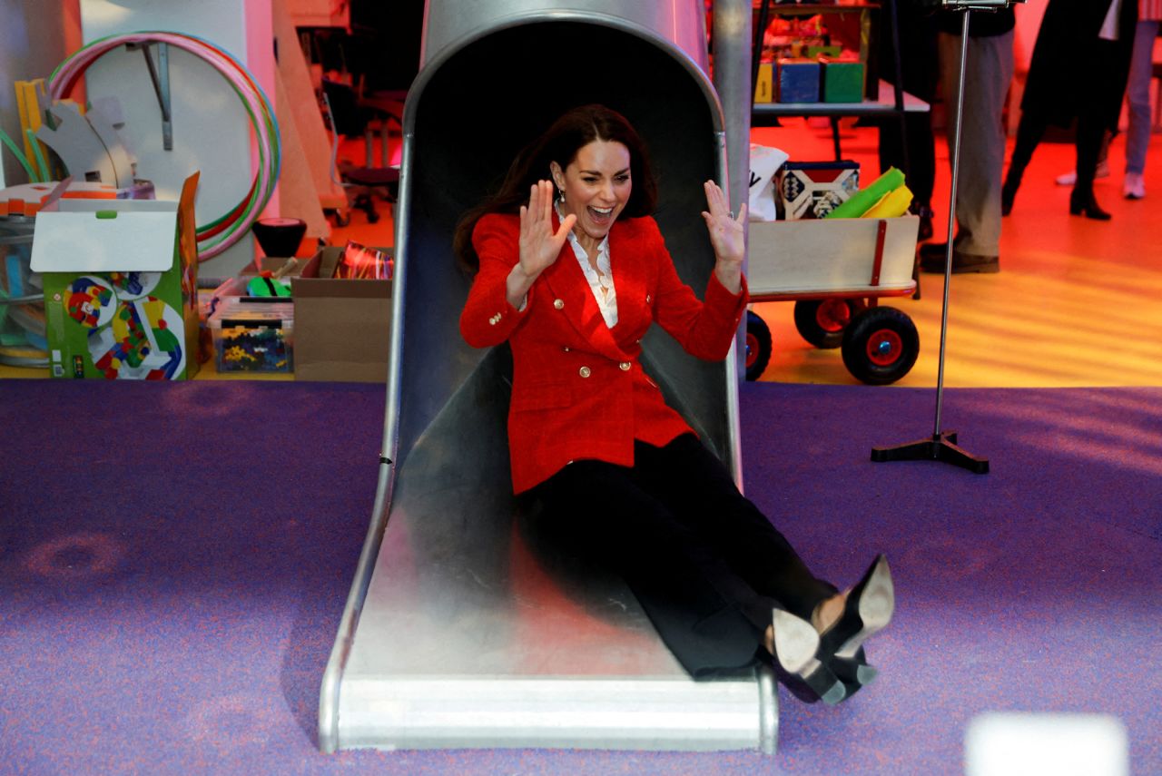 Britain's Catherine, Duchess of Cambridge, goes down a slide during a visit to the LEGO Foundation PlayLab in Copenhagen, Denmark, on Tuesday, February 22.