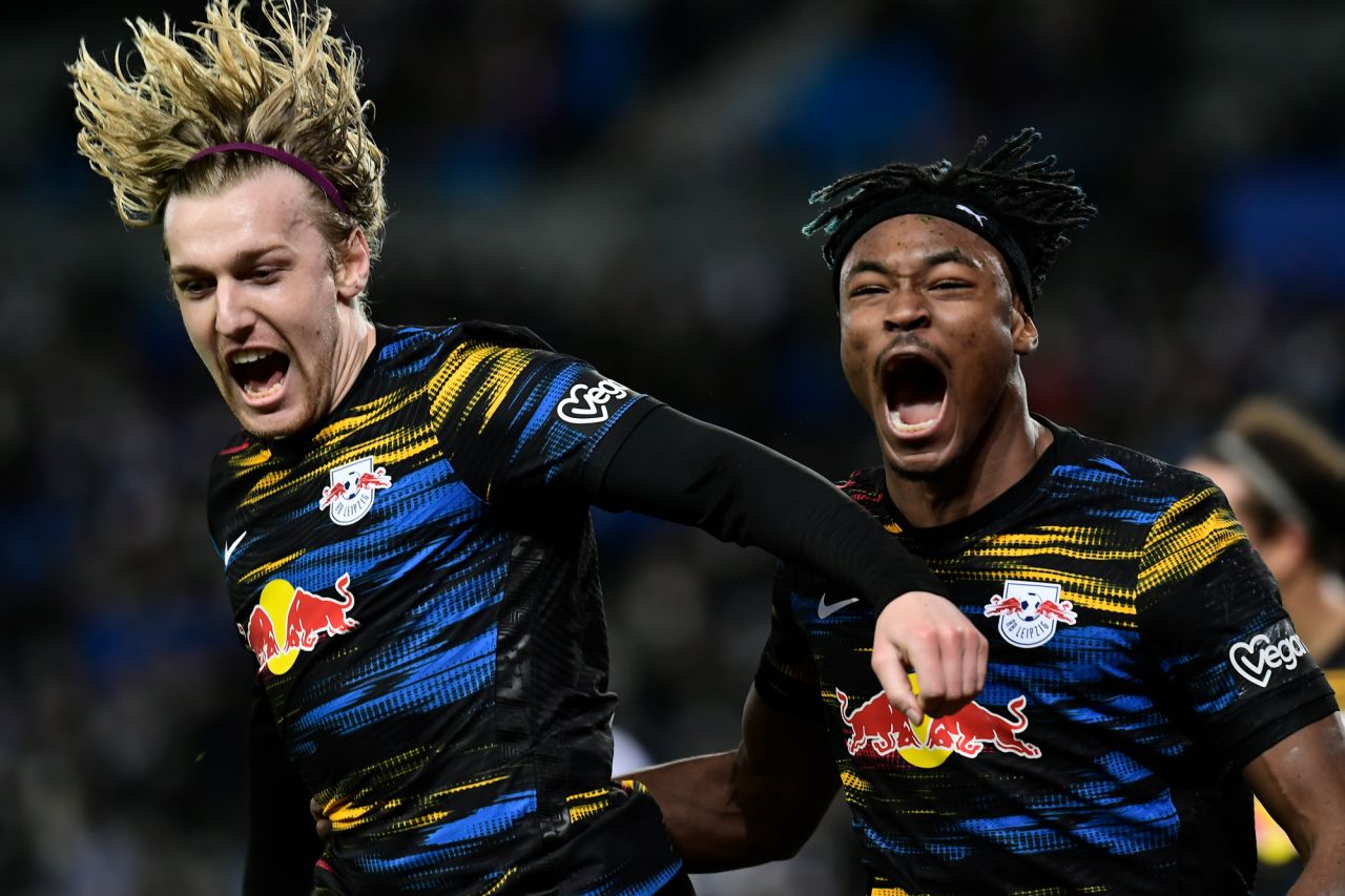 RB Leipzig's Emil Forsberg, left, celebrates after scoring during the Europa League playoff game against Real Sociedad in San Sebastian, Spain, on Thursday, February 24. Leipzig won 3-1.
