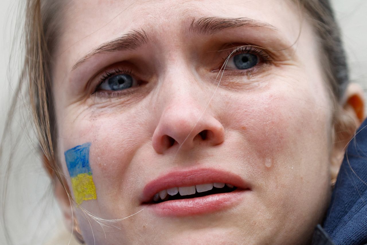 A woman cries during a pro-Ukrainian demonstration near Downing Street in London on Thursday, February 24.