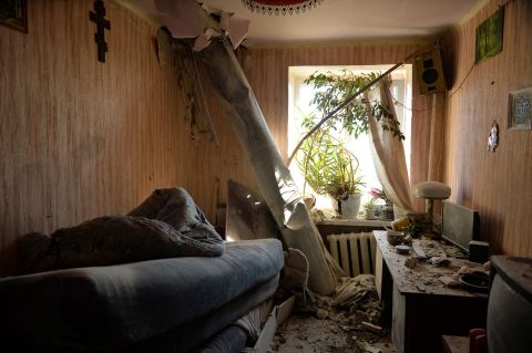 The body of a rocket remains in an apartment after shelling on the northern outskirts of Kharkiv on February 24.