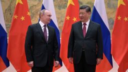 Russian President Vladimir Putin (L) and Chinese President Xi Jinping pose during their meeting in Beijing, on February 4, 2022. 