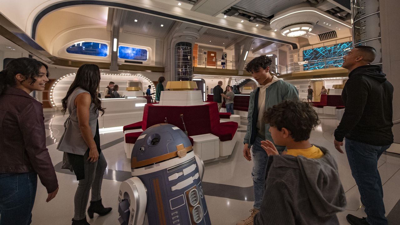 Astromech droid SK-62O greets guests in the Atrium, the heart of the action and where many main events take place during your two-night stay.