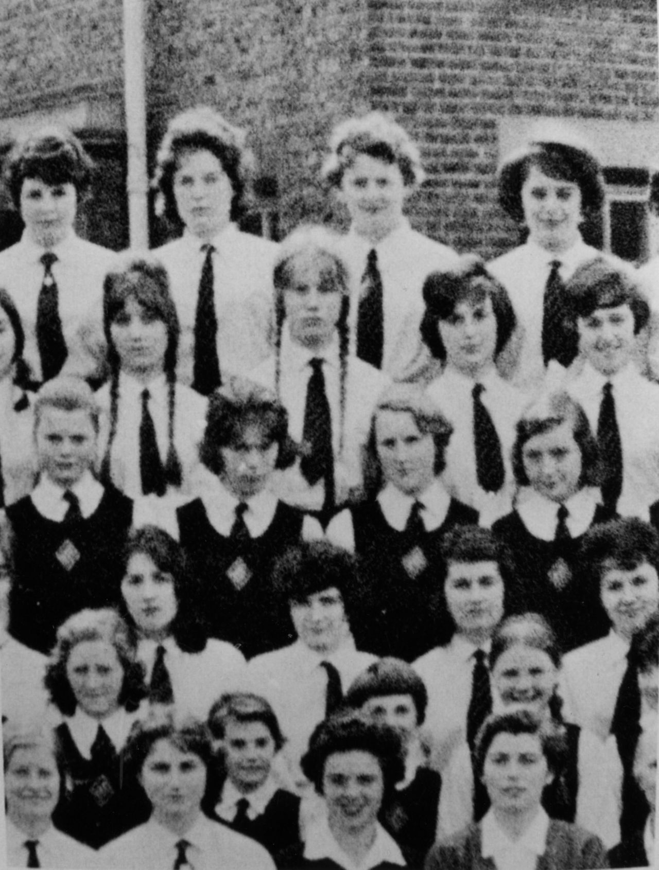 Mirren, center, is seen wearing pigtails at St. Bernard's High School in Westcliff-on-Sea, England, in 1961.
