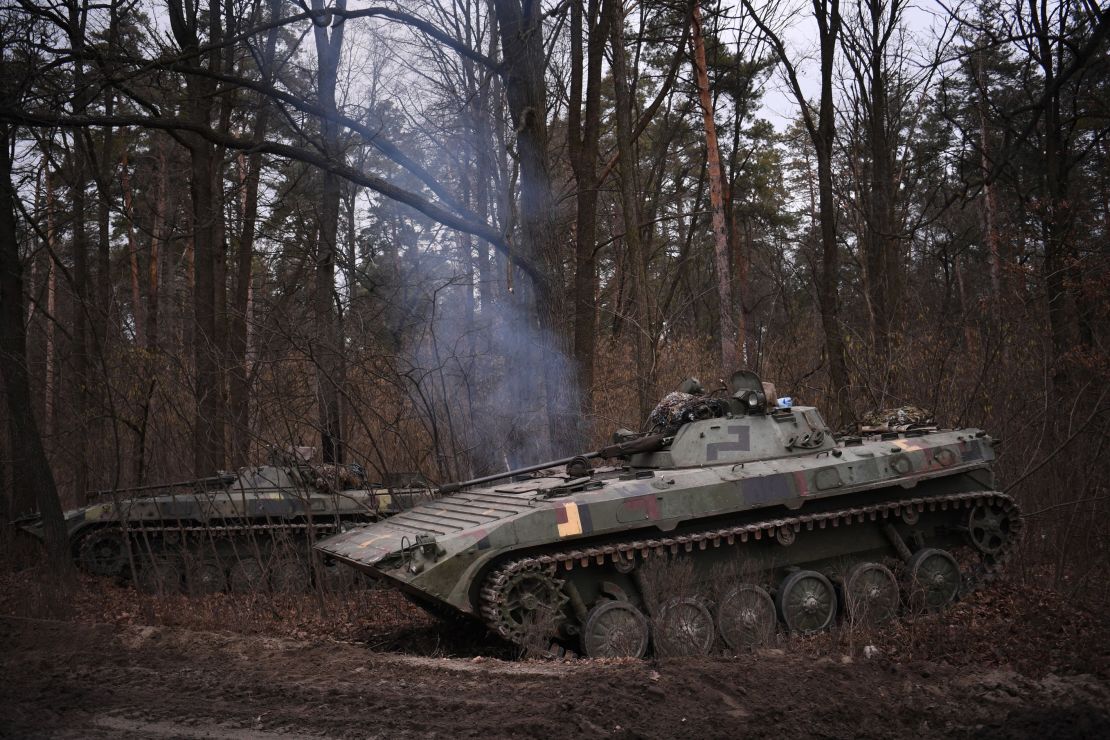 A photograph taken on February 24, 2022 shows an Ukrainian infantry combat vehicle standing guard on the outskirts of Kyiv.