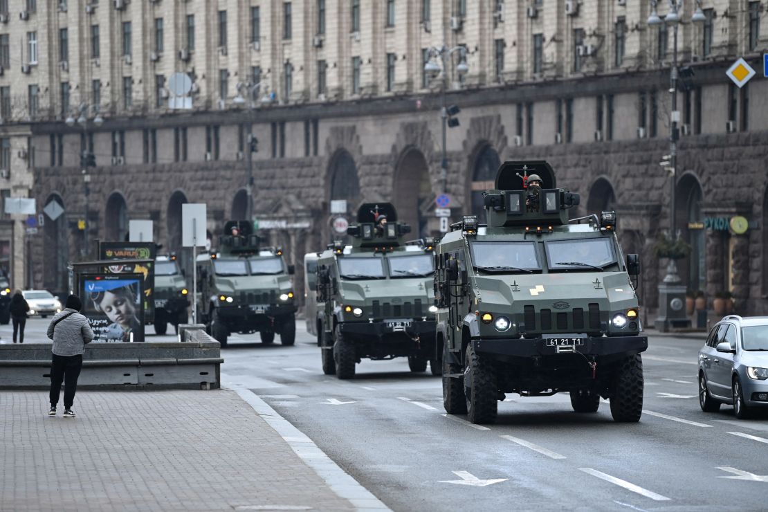 Ukrainian military vehicles move past Independence square in central Kyiv on Thursday. 