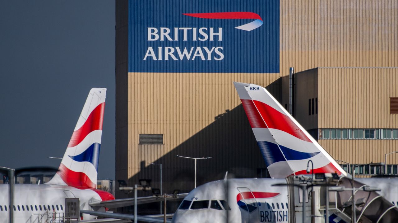 The British Airways livery on the tail fins of passenger aircraft at Heathrow Airport in London, UK, on Feb. 23, 2022. 