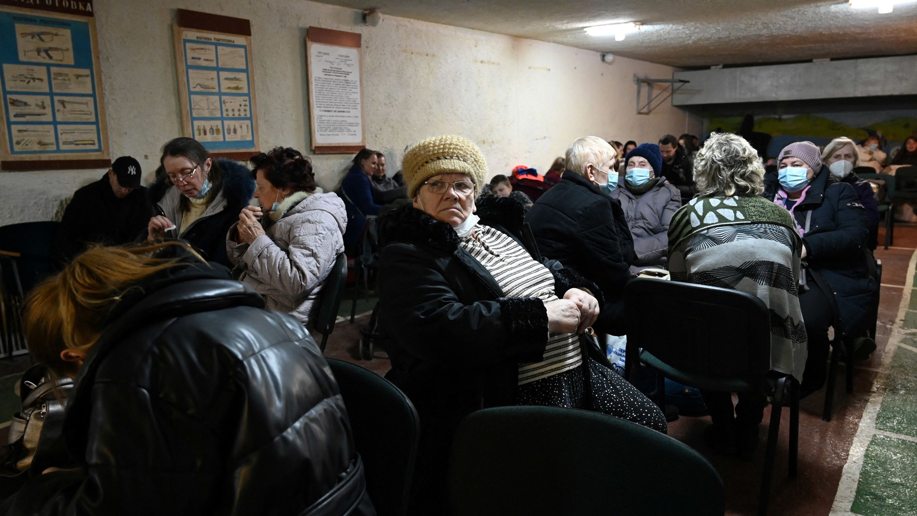People gather in an air raid shelter in Kyiv, Ukraine on February 24, 2022.  