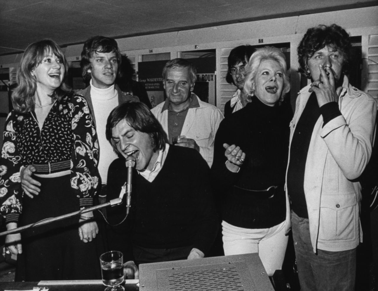 From left, Mirren, Malcolm McDowell, Lindsay Anderson, Rachel Roberts and Miroslav Ondricek sing around Alan Price as he plays the piano at the Cannes Film Festival in France.