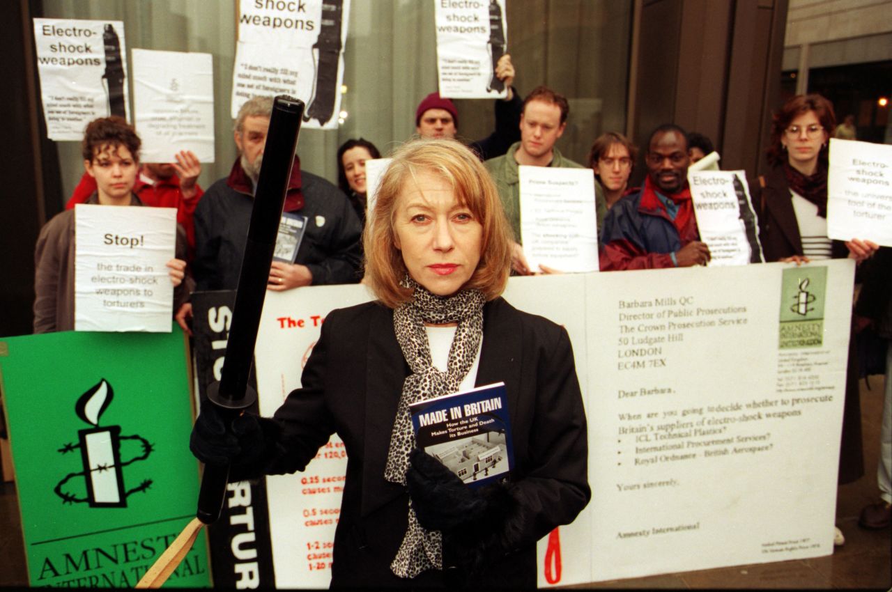 Mirren participates in an Amnesty International protest against stun guns in 1997.