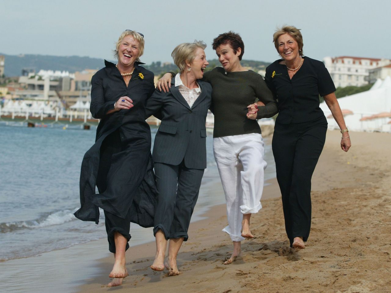 From left, Trisha Stewart, Mirren, Angela Baker and Julie Walters pose during a photocall for the film "Calendar Girls" during the Cannes Film Festival in France in 2003.