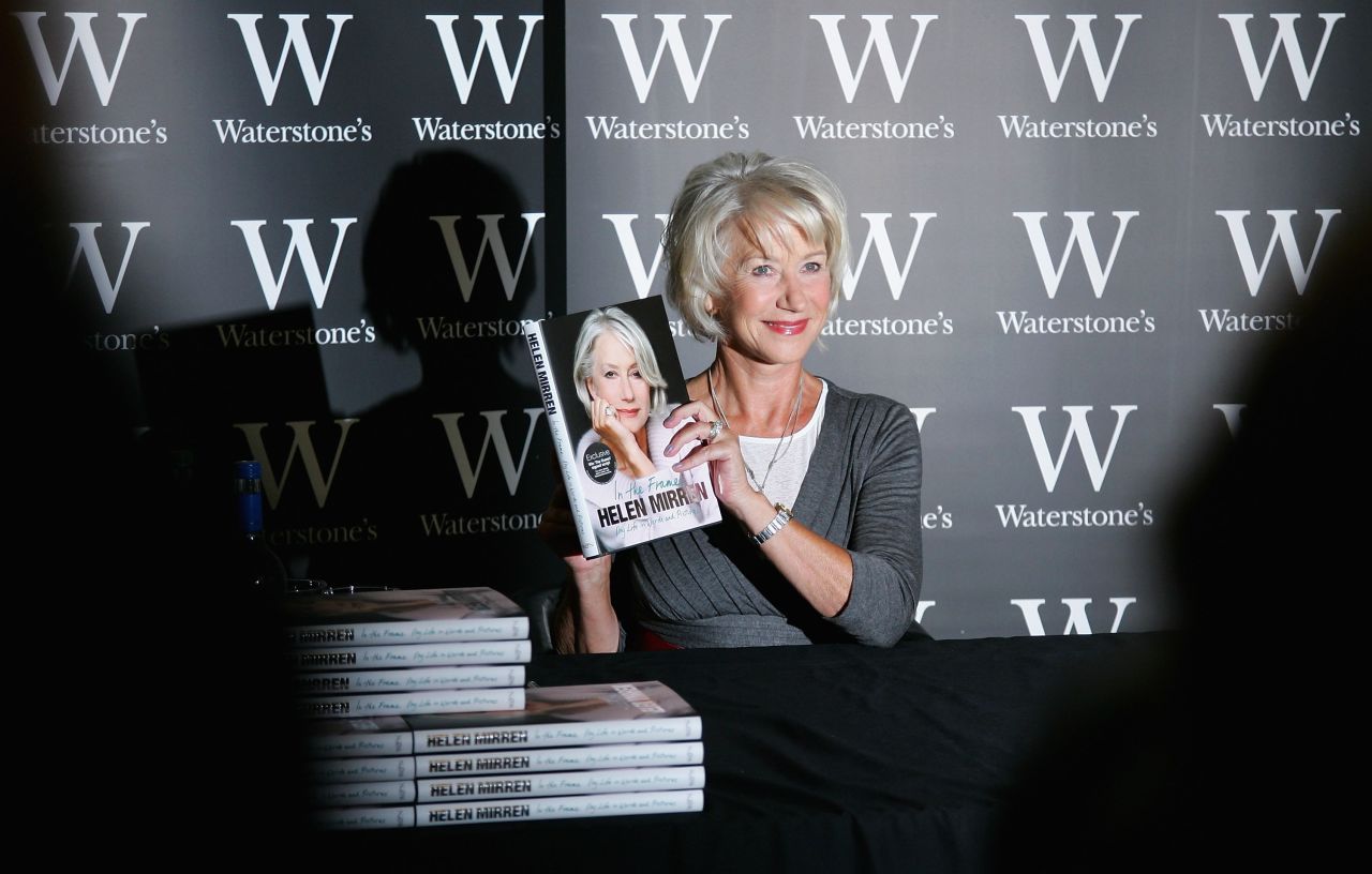 Mirren shows off a copy of her book, "In the Frame: My Life in Words and Pictures," at a book shop in London in 2007.