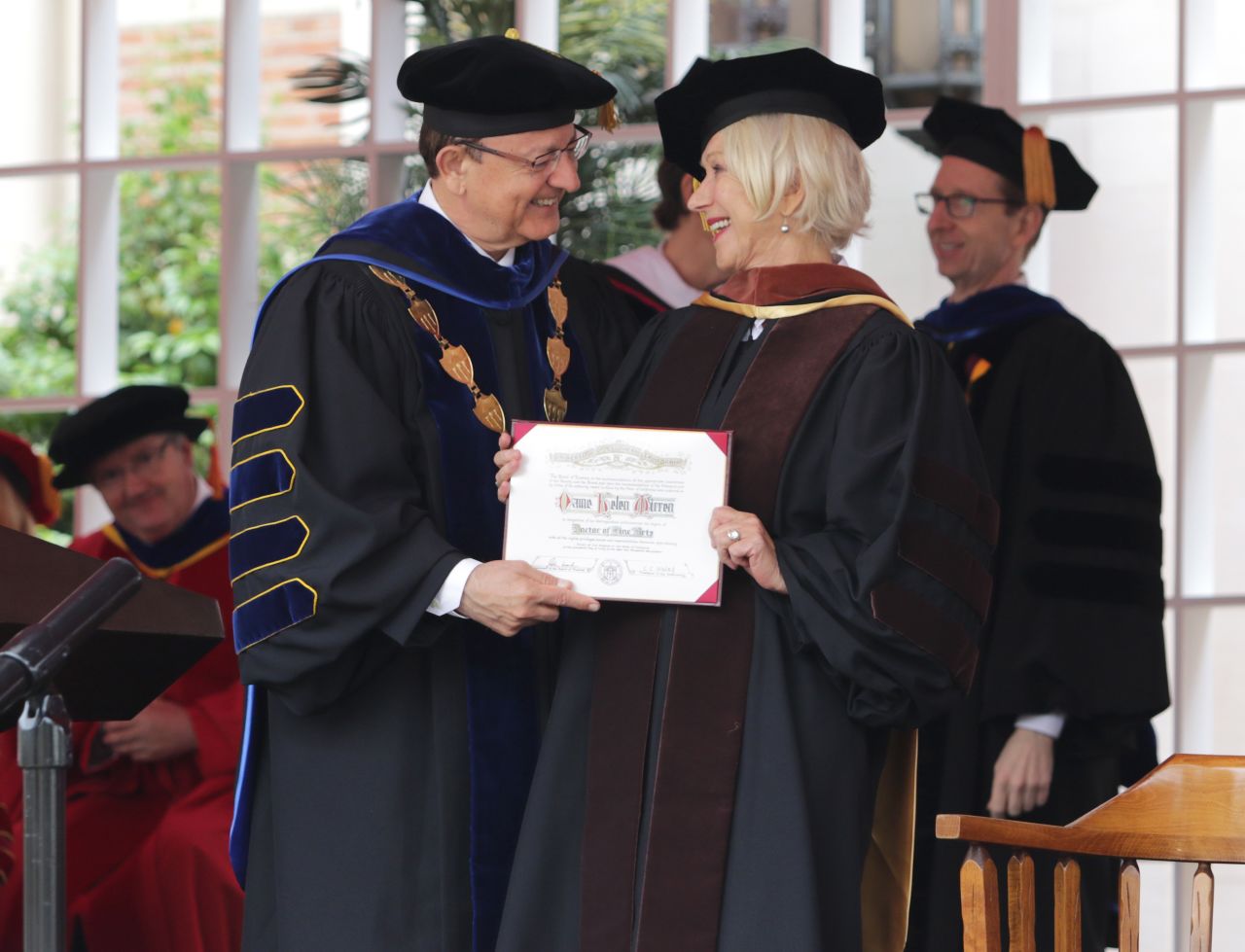 In 2017, Mirren is presented with an honorary doctorate degree by the University of Southern California President C.L. Max Nikias.