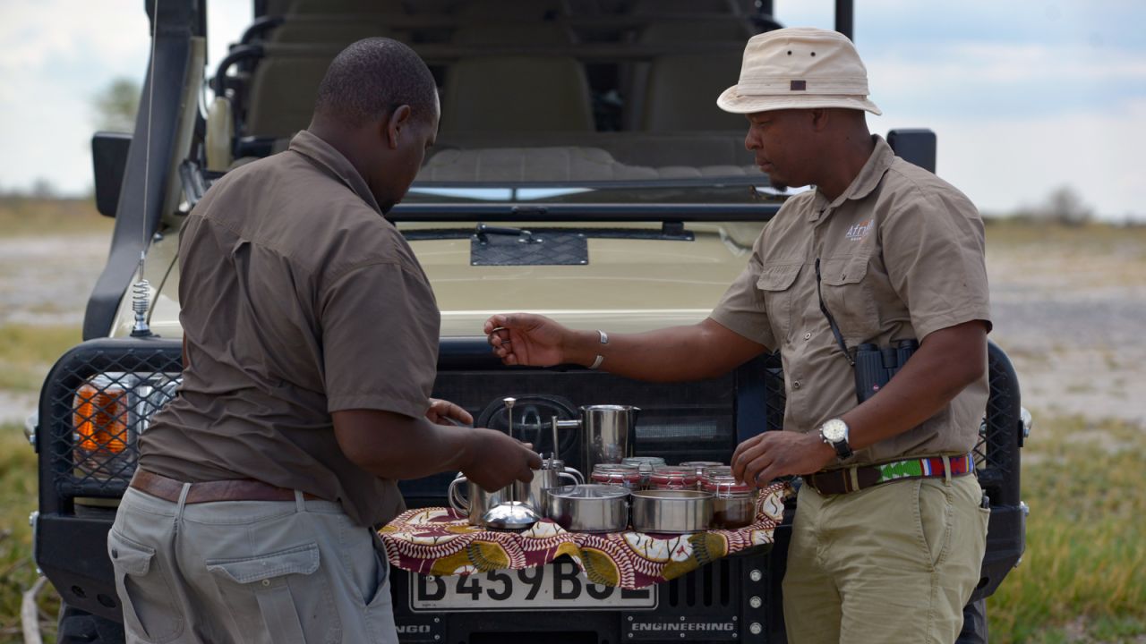 <strong>On the trail: </strong>African Bush Camps guide Kenneth Mungomba (left), and the company's founder, Beks Ndlovu, are experts at tracking the wildlife of Botswana's Nxai Pan National Park.