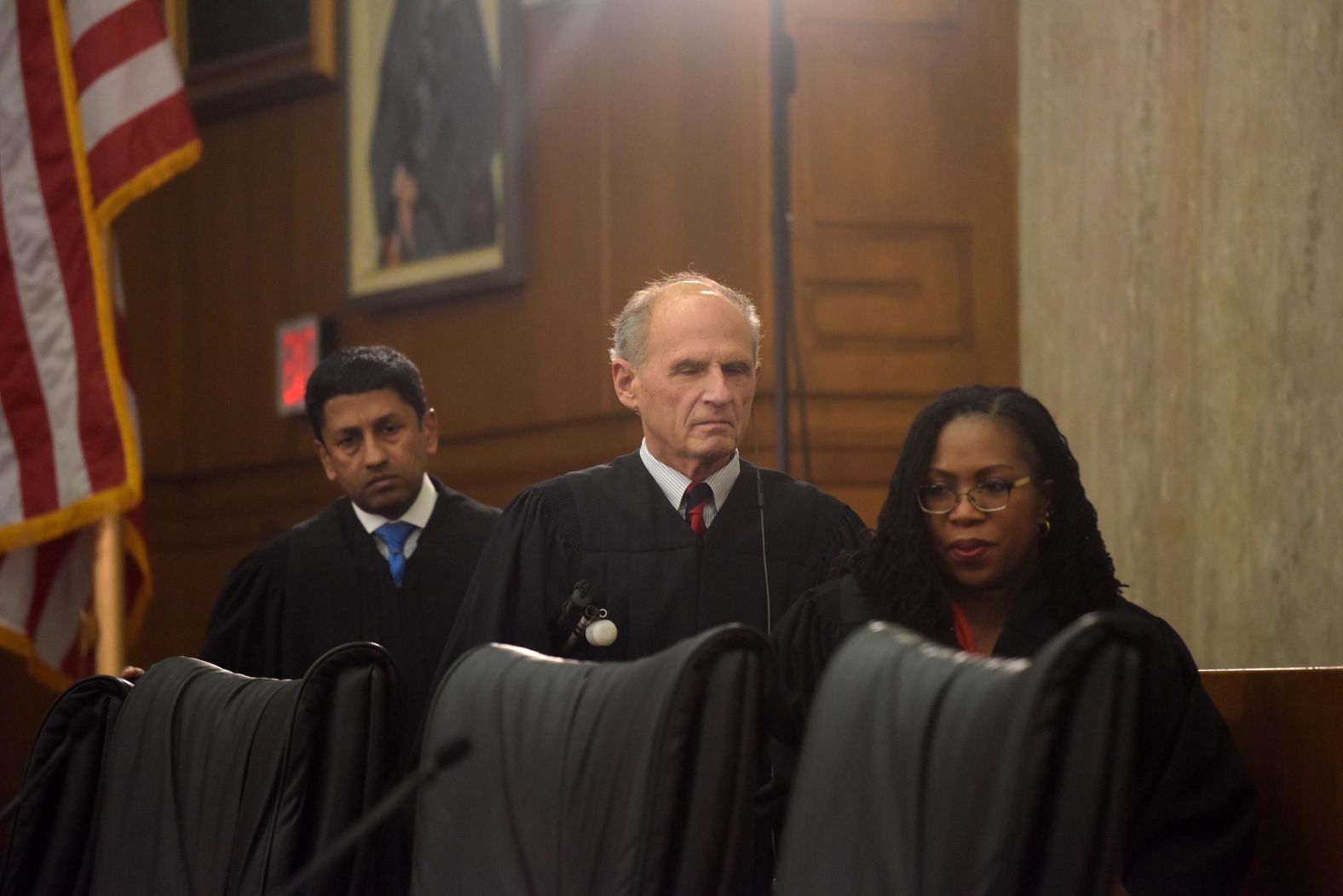 From left, Judges Sri Srinivasan, David Tatel and Jackson walk into a ceremonial courtroom in 2017 during a high school mock trial in Washington, DC.