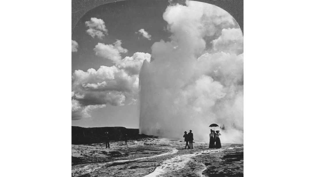 <strong>Old-style Old Faithful:</strong> People visit Old Faithful geyser in 1901. Old Faithful is one of nearly 500 geysers in Yellowstone.