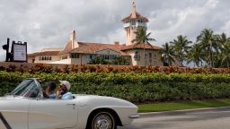 A car passes in front of former President Donald Trump's Mar-a-Lago resort on February 11, 2022 in Palm Beach, Florida. 