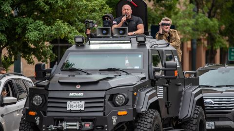 Alex Jones and other protesters take to the streets in Austin, Texas in April 2020 to call for the country to open up despite the pandemic.  