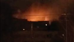 A frame taken from a video shared on Twitter shows explosions purportedly taken near the Kyiv Zoon.