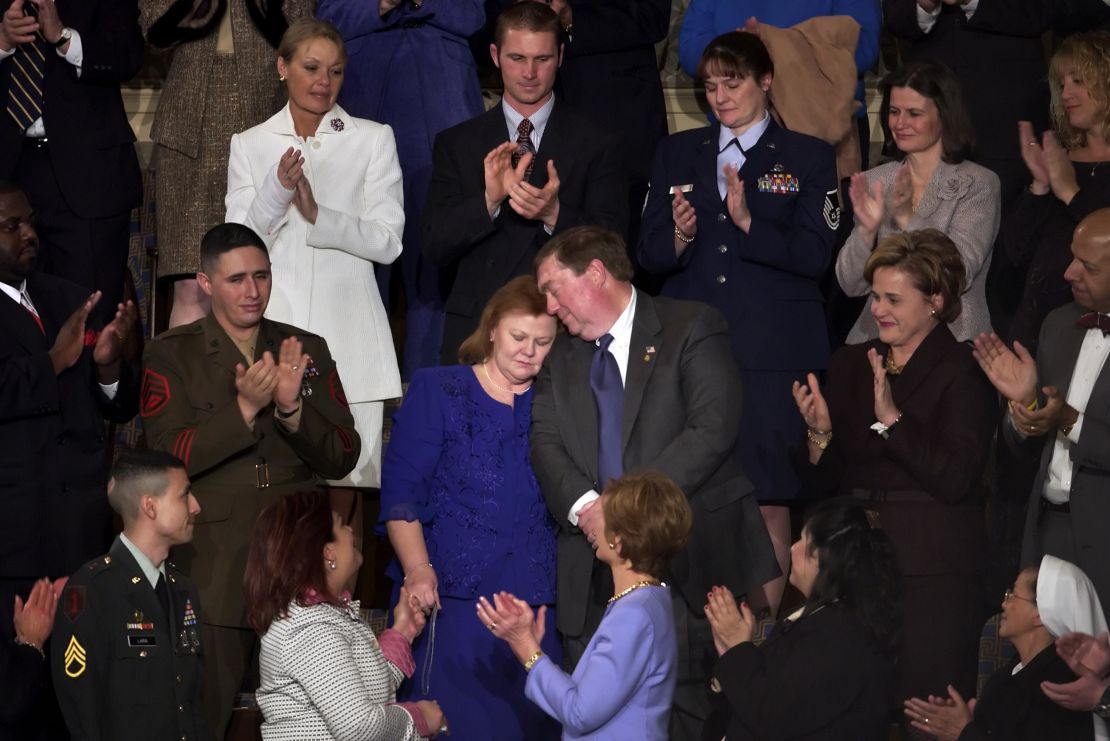 Parents of deceased Marine Sgt. Byron Norwood, Janet and William Norwood, stand after being mentioned by President George W. Bush during the State of the Union address in 2005.
