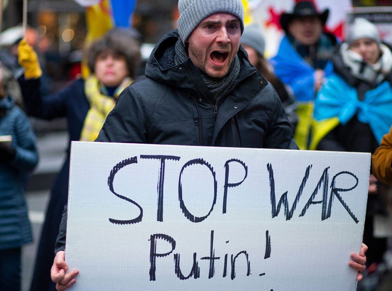 Demonstrators rally at Times Square in New York on February 24.