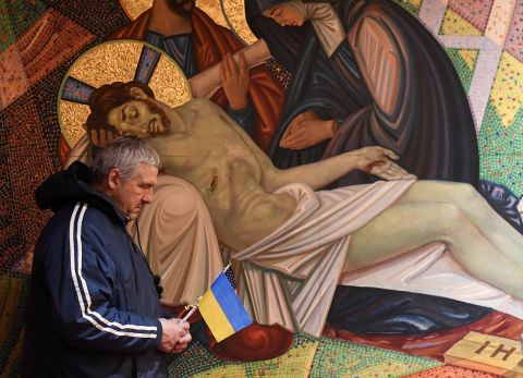 A Ukraine supporter in Minneapolis attends a prayer service inside the St. Constantine Ukrainian Catholic Church on February 24.