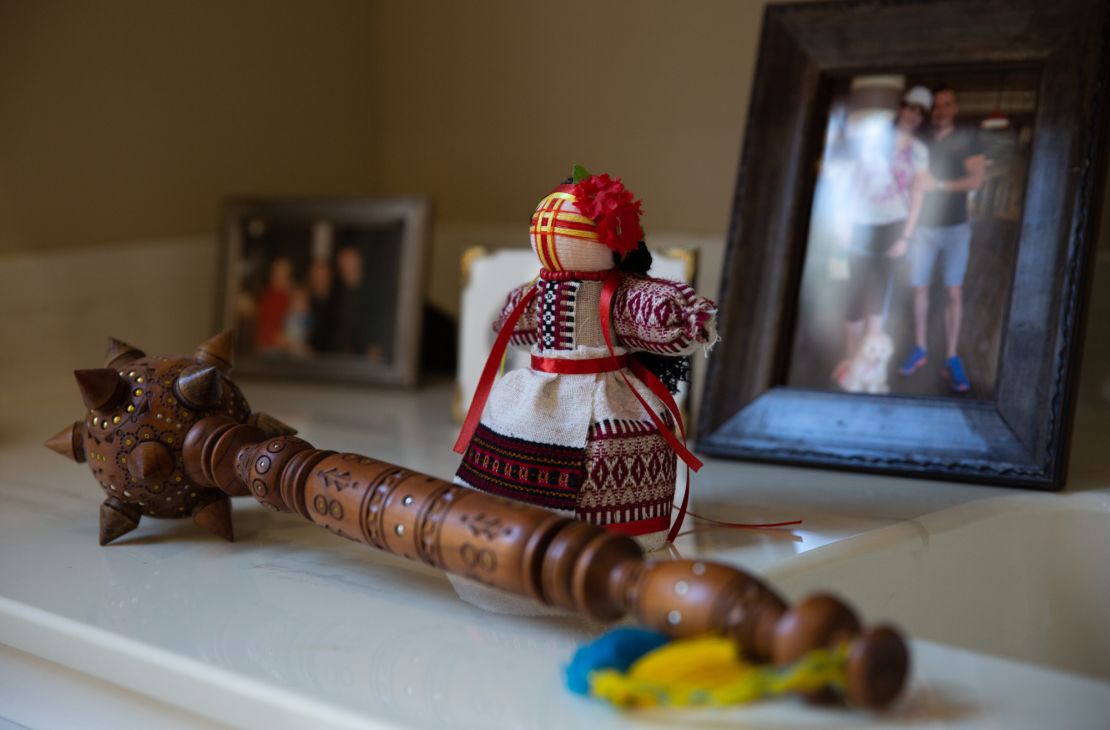 Ukrainian mementos in  Alex Podebryi's home include a bulava club and a handmade motanka doll. 