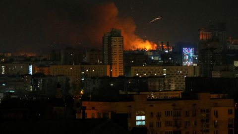 Smoke and flames are seen near Kyiv on February 26. Explosions were seen and heard in parts of the capital as Ukrainians battled to hold back advancing Russian troops.
