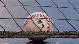DETROIT, MI - SEPTEMBER 17:  A detailed view of a Rawlings official Major League Baseball sitting on top of the dugout behind the protective netting during the game between the Cleveland Indians and the Detroit Tigers at Comerica Park on September 17, 2020 in Detroit, Michigan. The Indians defeated the Tigers 10-3.  (Photo by Mark Cunningham/MLB Photos via Getty Images)