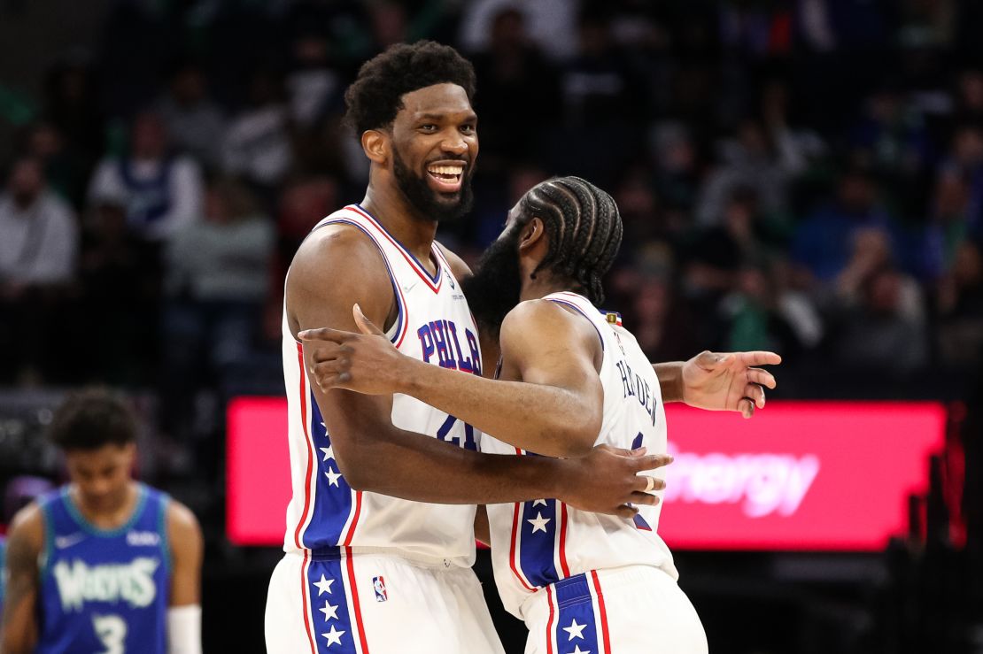 Embiid and Harden celebrate after Harden drew a foul against Karl-Anthony Towns of the Minnesota Timberwolves in the fourth quarter.