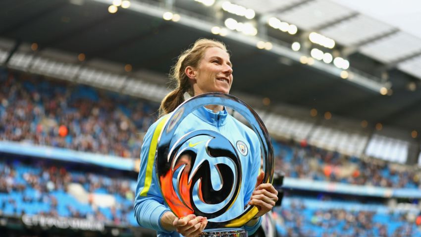 MANCHESTER, ENGLAND - MAY 16:  Karren Bardsley of Manchester City laddies team presents the Women's Super League 1 trophy to the Manchester City fans prior to the Premier League match between Manchester City and West Bromwich Albion at Etihad Stadium on May 16, 2017 in Manchester, England.  (Photo by Clive Mason/Getty Images)