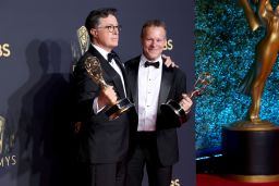 Stephen Colbert and Chris Licht pose in the press room during the 73rd Primetime Emmy Awards on September 19, 2021 in Los Angeles.