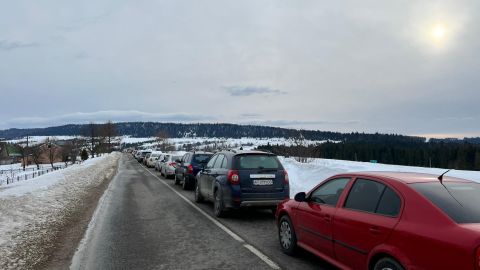Ukrainians waiting in a queue of cars to cross the border into Poland, February 26, 2022.