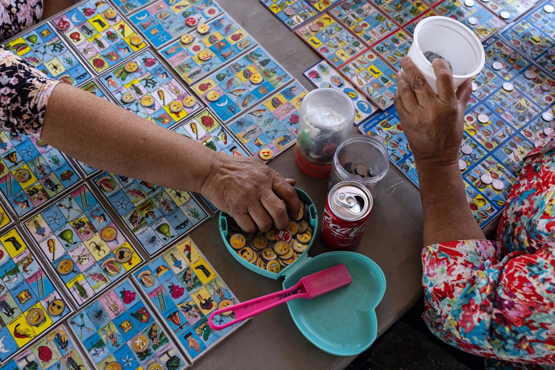 People play lotería for a chance to win prizes at the Pulga Los Portales.