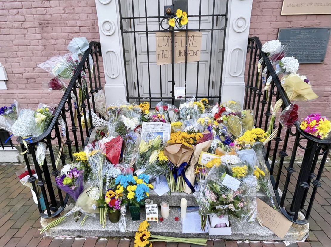 Flowers are seen left on the steps of the Ukraine Embassy in Washington on February 26.