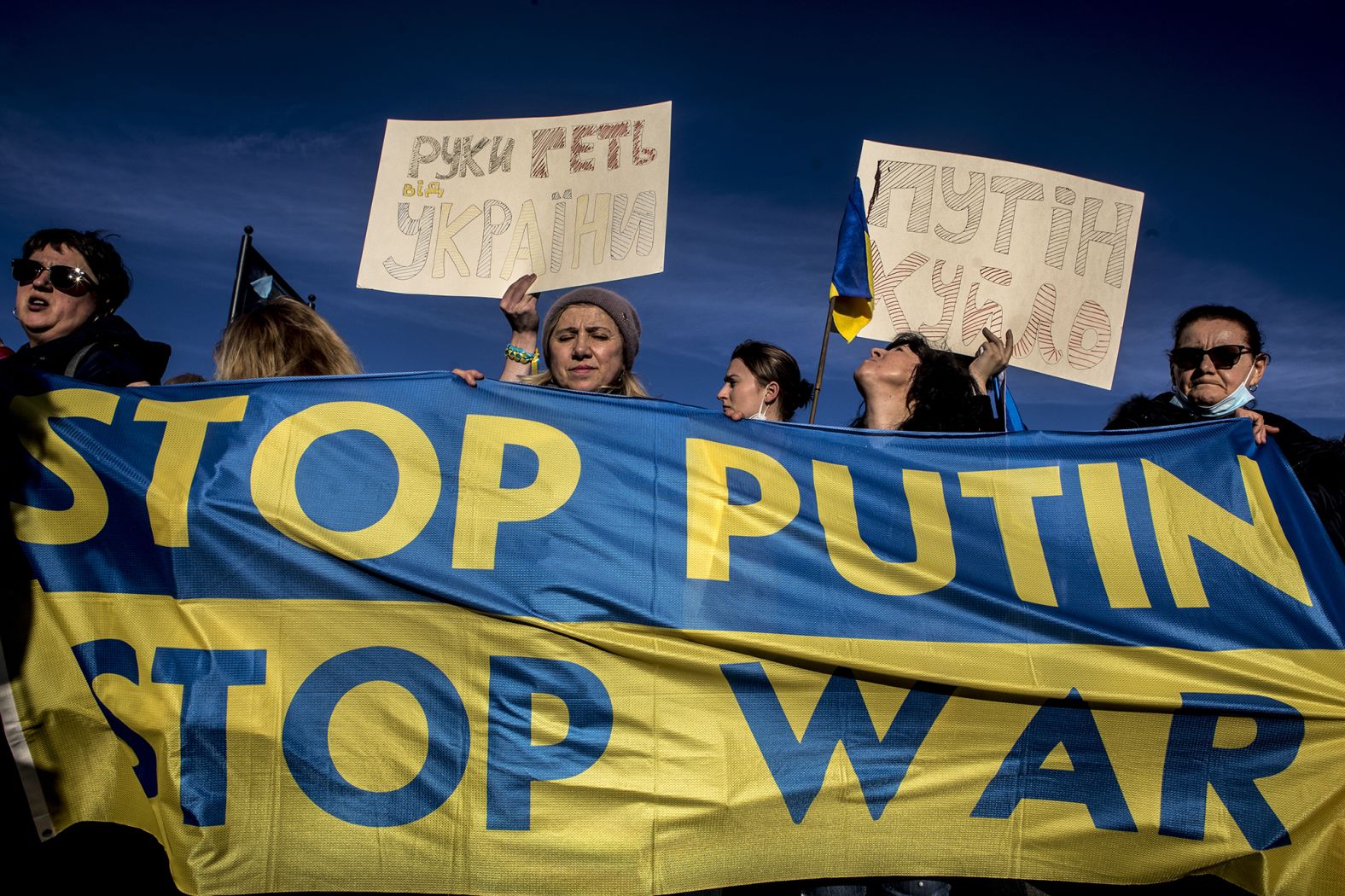 People protest in Rome on February 24.