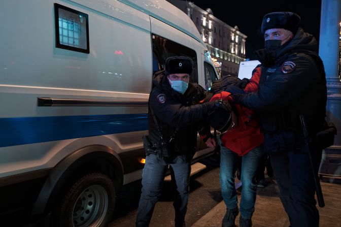 A demonstrator against the invasion is led away by police in Moscow on February 24. Hundreds of protesters in Russia <a href="index.php?page=&url=https%3A%2F%2Fwww.cnn.com%2Feurope%2Flive-news%2Fukraine-russia-news-02-26-22%2Fh_47259230fa3e94fee0c12d5703f4ade9" target="_blank">have been detained in anti-war protests,</a> independent protest monitoring site OVD-Info said. Russia's Investigative Committee warned that participation in any anti-war protest was illegal. It also said that offenses could be entered on participants' criminal records which would "leave a mark on the person's future."
