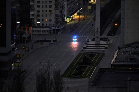 A police vehicle patrols the streets of Kyiv on February 26.