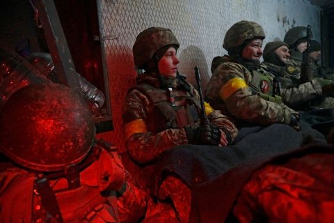 Ukrainian service members take cover in a shelter at the Vasylkiv Air Base near Kyiv on Saturday, February 26.