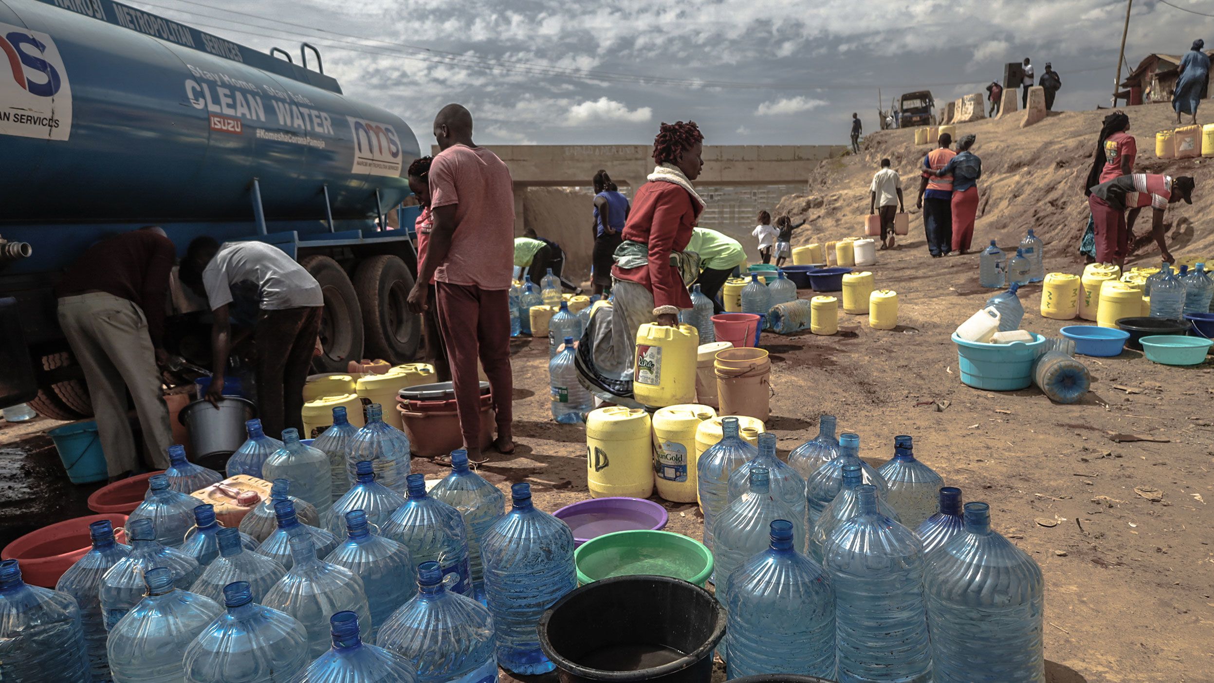 Residents fill water containers during a shortage in Nairobi, Kenya, in January.