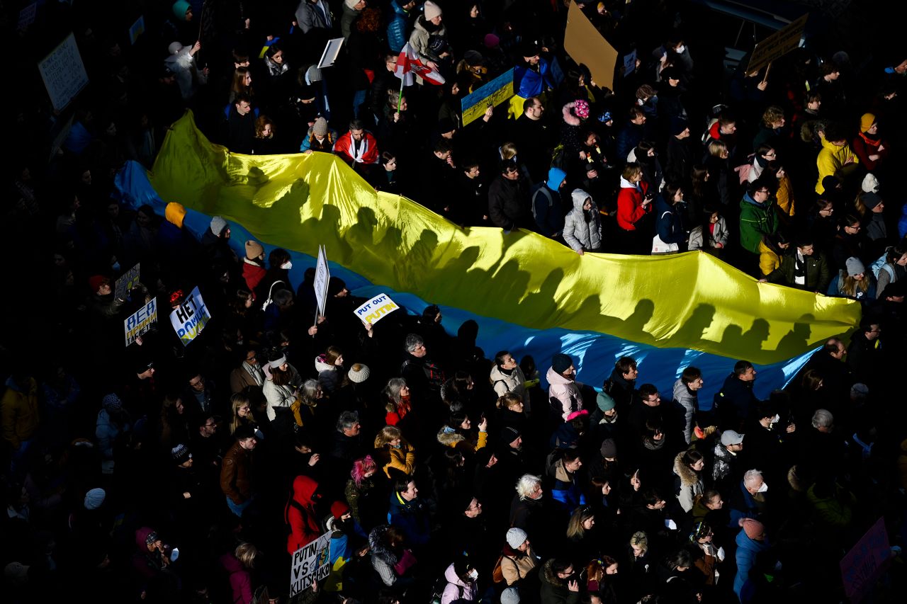 People gather for a demonstration in Prague, Czech Republic, on February 27. <a href="https://www.cnn.com/europe/live-news/ukraine-russia-news-02-27-22/h_6fdd49696f27d7f495309869ff0fac3a" target="_blank">The event in Prague</a> was particularly poignant given that many of its attendees experienced a Russian invasion firsthand. In 1968, Soviet-led armies of the Warsaw Pact invaded Czechoslovakia, crushing the so-called Prague Spring democratic reform movement and restoring the totalitarian communist regime. The troops stayed in Czechoslovakia for over two decades, with the last leaving in 1991.