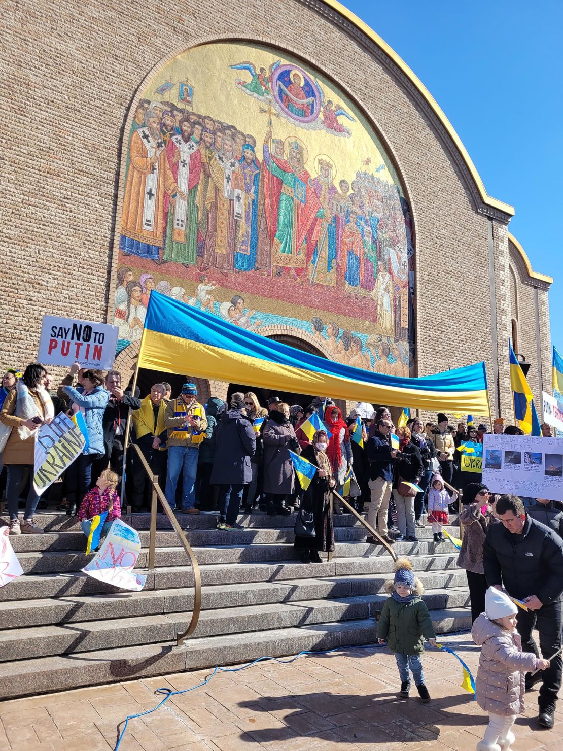 Demonstrators call for solidarity with Ukraine at a rally in Chicago on Sunday, February 27, 2022.